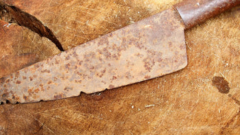A rusty knife on a countertop