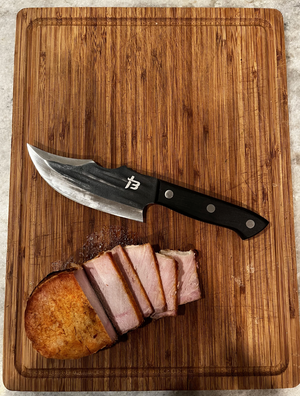 Midnight Utility Knife On Cutting Board